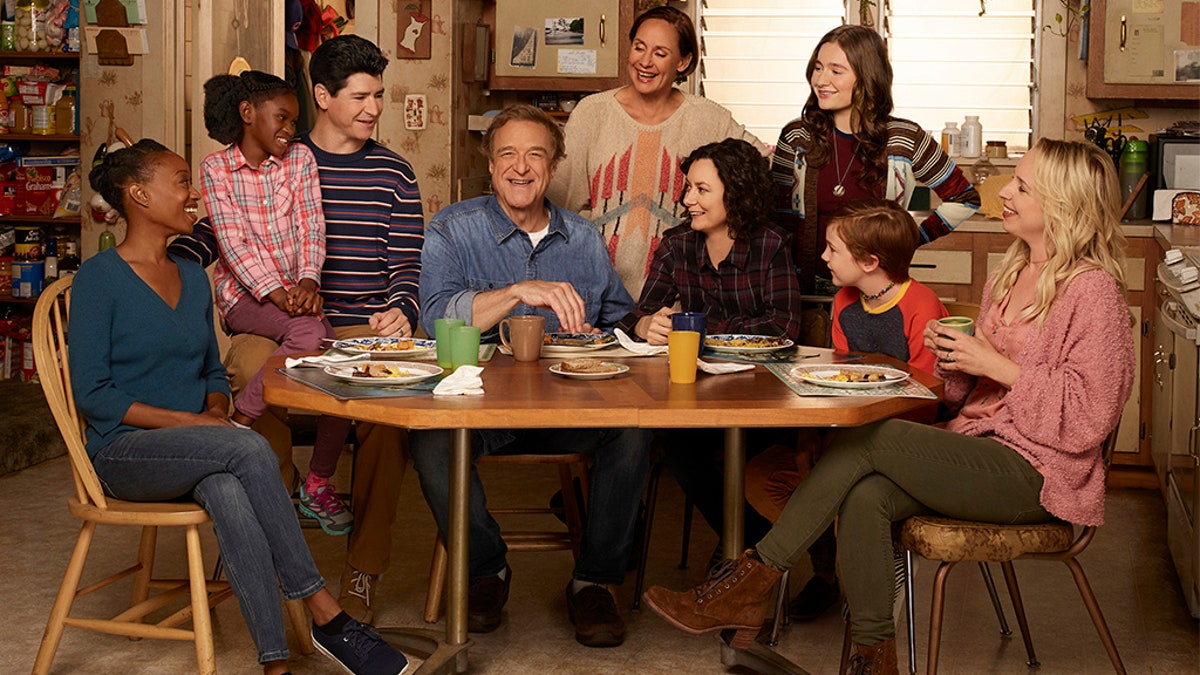 'The Conners' stars Maya Lynne Robinson as Geena Williams-Conner, Jayden Rey as Mary, Michael Fishman as D.J. Conner, John Goodman as Dan Conner, Laurie Metcalf as Jackie Harris, Sara Gilbert as Darlene Conner, Emma Kenney as Harris Conner, Ames McNamara as Mark, and Lecy Goranson as Becky Conner. (Robert Trachtenberg/Walt Disney Television via Getty Images)