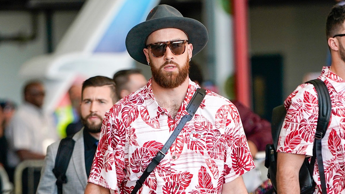 Kansas City Chiefs' Travis Kelce arrives for the NFL Super Bowl 54 football game Sunday, Jan. 26, 2020, at the Miami International Airport in Miami. (AP Photo/David J. Phillip)