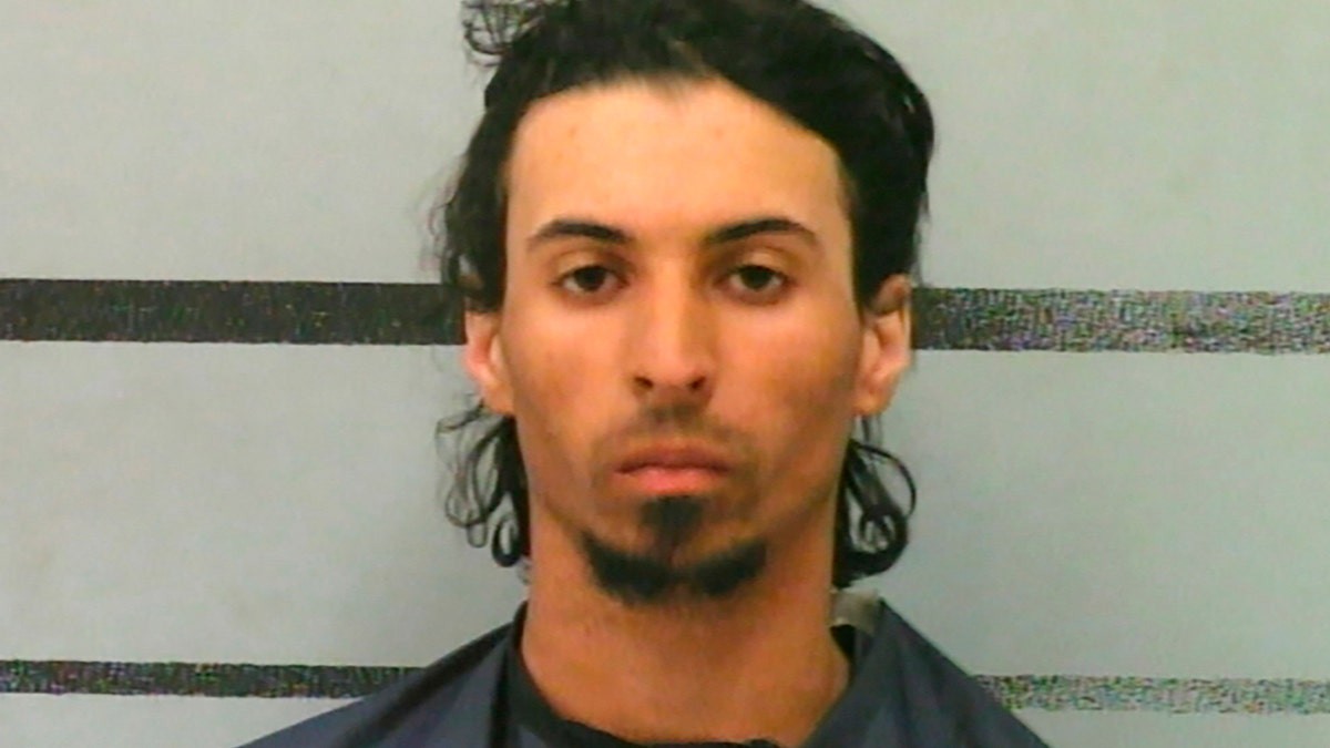 Rowe, accused of stuffing his girlfriend's 10-month-old daughter into a backpack and leaving her in a car trunk for hours, was charged Wednesday with capital murder in her death. (Lubbock County Jail via AP)