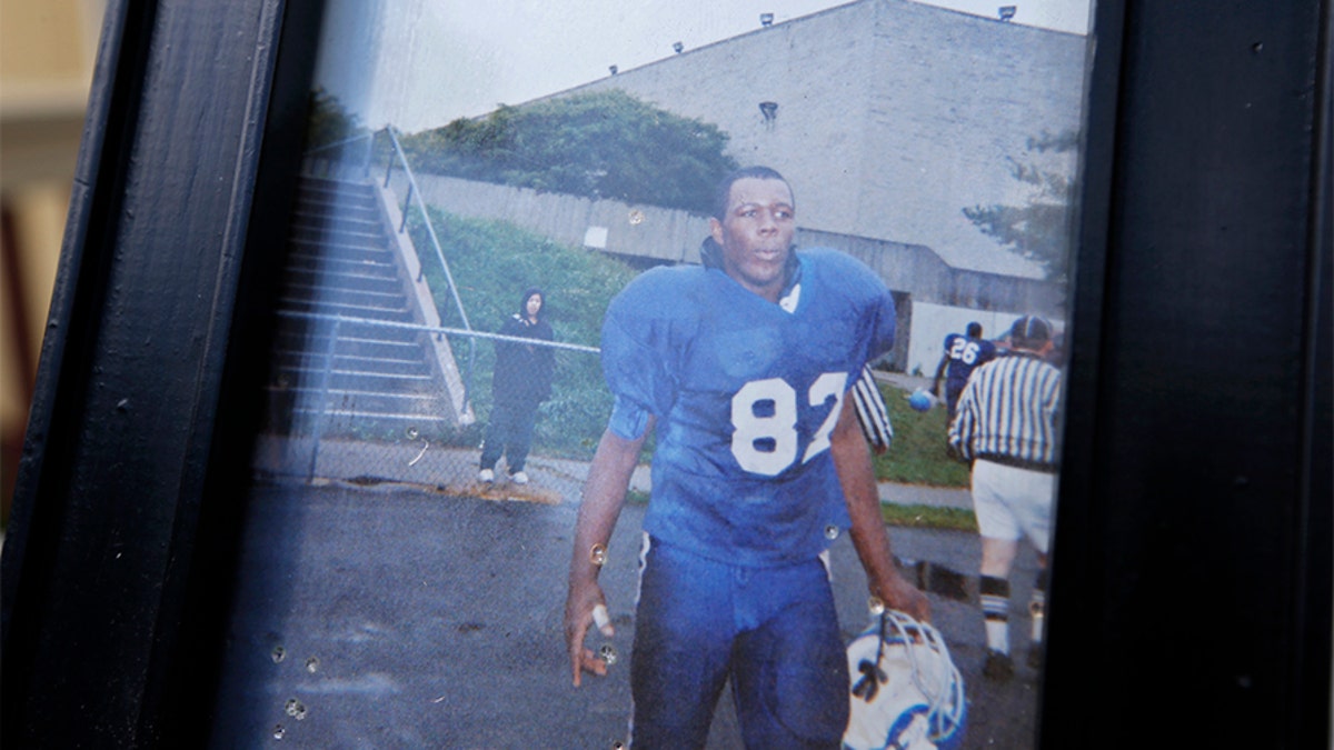 Trophies and a picture of Odin Lloyd were left at 10 Fayston Street where Lloyd resided in Dorchester neighborhood of Boston on June 20, 2013. Lloyd's body was found in North Attleborough.