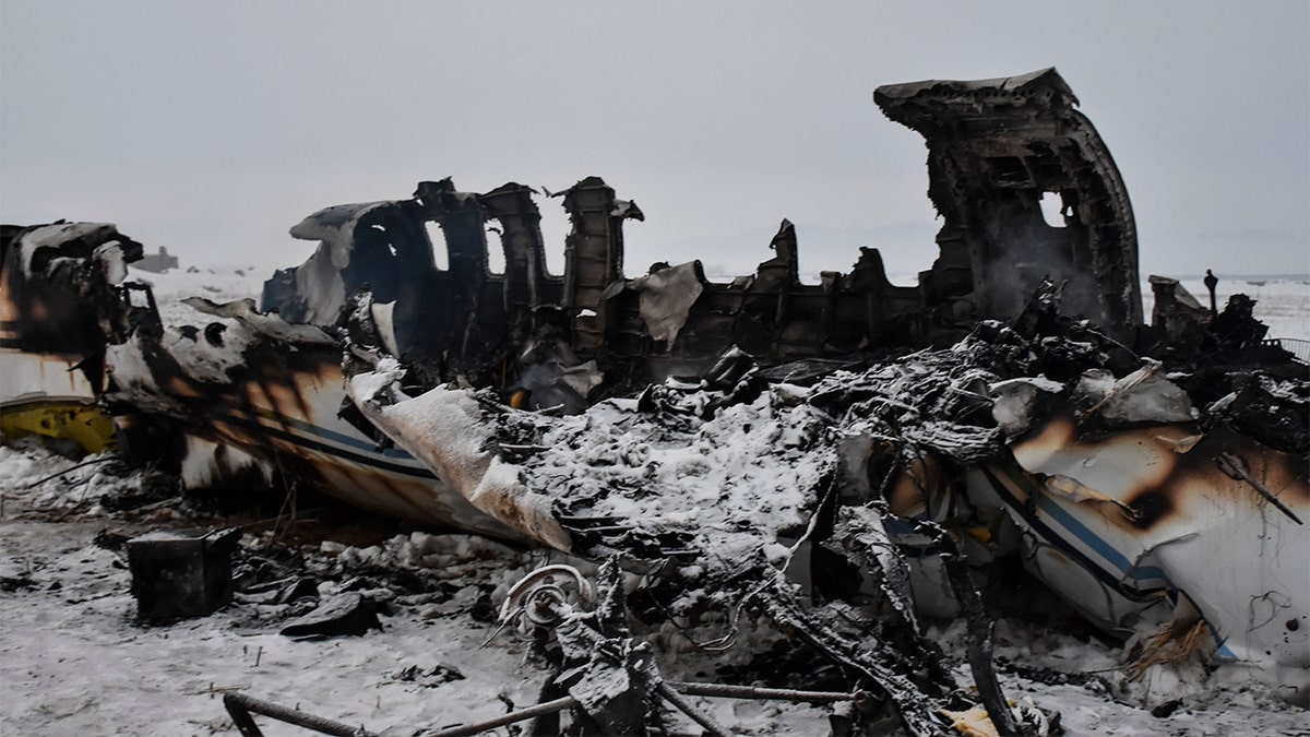 A wreckage of a U.S. military aircraft that crashed in Ghazni province, Afghanistan, is seen Monday. (AP PhotolSaifullah Maftoon)