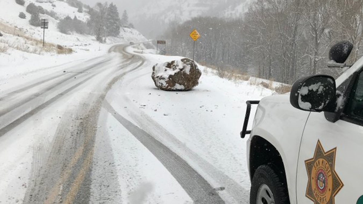 The "large boulder the size of a small boulder" fell on Colorado State Highway 145 outside Telluride on Monday afternoon.