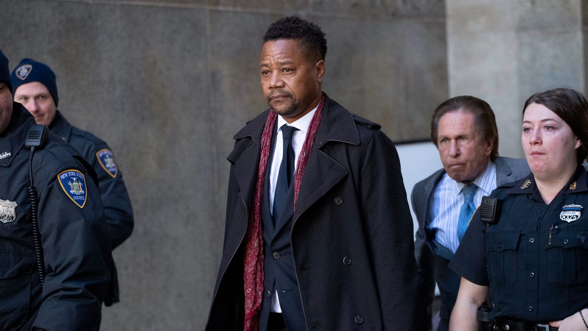 Cuba Gooding Jr. leaves court, Wednesday, Jan. 22, 2020, in New York. A New York City judge ruled that two additional women accusing Gooding of sexual misconduct will be allowed to testify at the "Jerry Maguire" actor's trial on charges he groped women at Manhattan bars in October 2018 and June 2019.