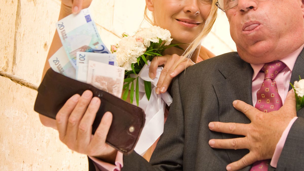 Bride taking money