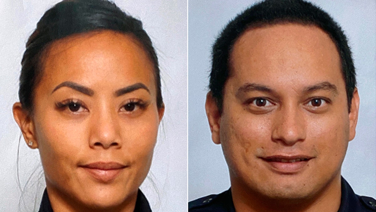 This undated photo provided by the Honolulu Police Department shows Officers Tiffany Enriquez, left, and Kaulike Kalama.