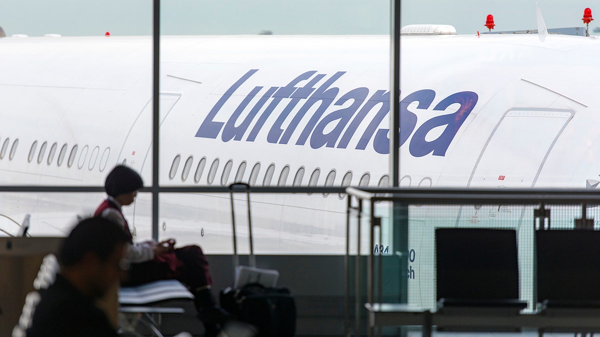 A Lufthansa flight parked at the gate in Germany