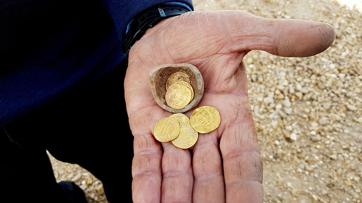 The hoard of gold coins. (Credit: Liat Nadav-Ziv, Israel Antiquities Authority)