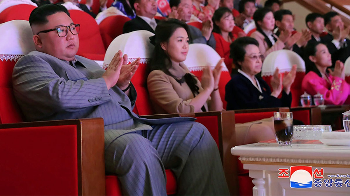 In this Saturday, Jan. 25, 2020, photo provided by the North Korean government, North Korean leader Kim Jong Un, center, claps with his wife Ri Sol Ju, third from right, and his aunt Kim Kyong Hui, second from right, as they attend a concert celebrating Lunar New Year's Day in Pyongyang, North Korea. (AP/Korean Central News Agency/Korea News Service)