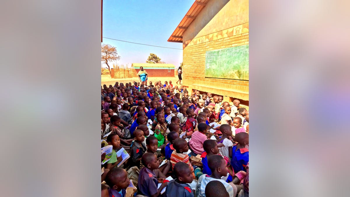 Children at the Chipala Primary School in Lilongwe, Malawi, frequently would learn lessons outdoors, seated shoulder-to-shoulder on loose, red dirt.