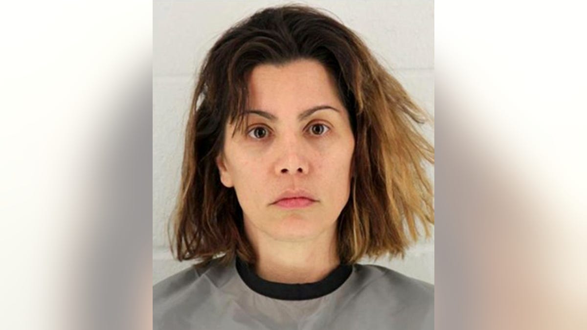 Mollie Fitzgerald, 38, was arrested on charges of second-degree murder in connection with the stabbing death of her mother, authorities say. (Johnson County Detention Center)