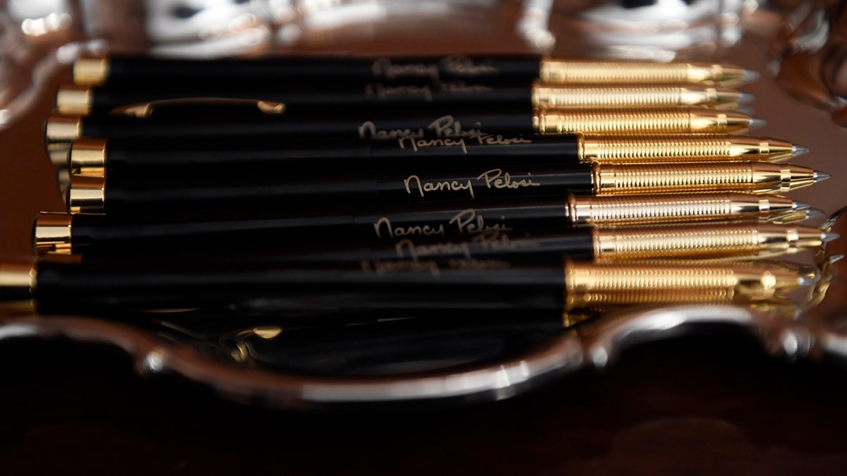 The pens that House Speaker Nancy Pelosi of Calif., will use to sign the resolution to transmit the two articles of impeachment against President Donald Trump to the Senate for trial on Capitol Hill in Washington, Wednesday, Jan. 15, 2020. . (AP Photo/Susan Walsh)