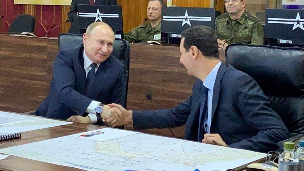 Vladimir Putin and Syrian President Bashar Assad 