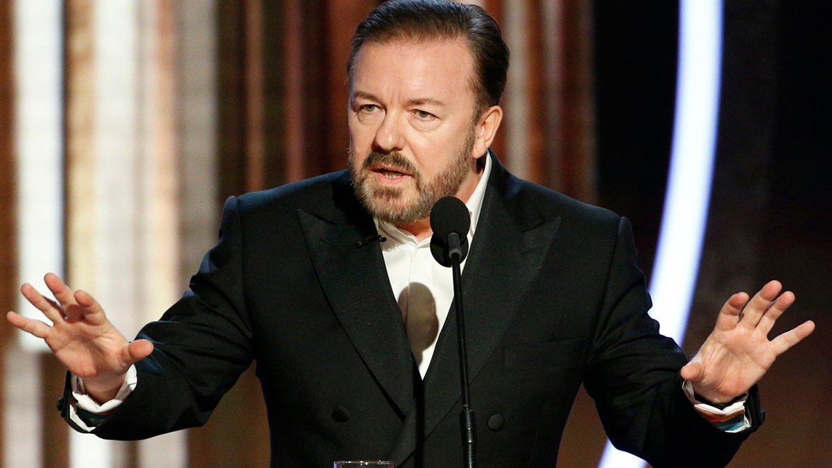 This image released by NBC shows host Ricky Gervais speaking at the 77th Annual Golden Globe Awards at the Beverly Hilton Hotel in Beverly Hills, Calif., on Sunday, Jan. 5, 2020. (Paul Drinkwater/NBC via AP)