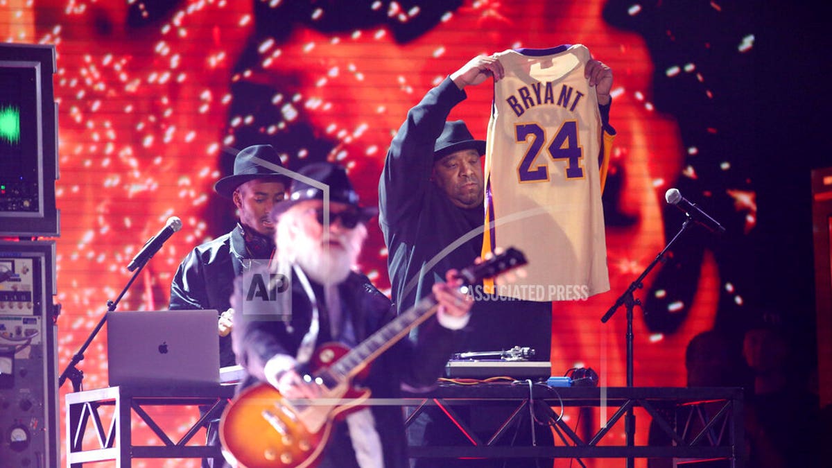 Joseph Simmons holds a jersey of the late Kobe Bryant at the 62nd annual Grammy Awards on Sunday, Jan. 26, 2020, in Los Angeles. 