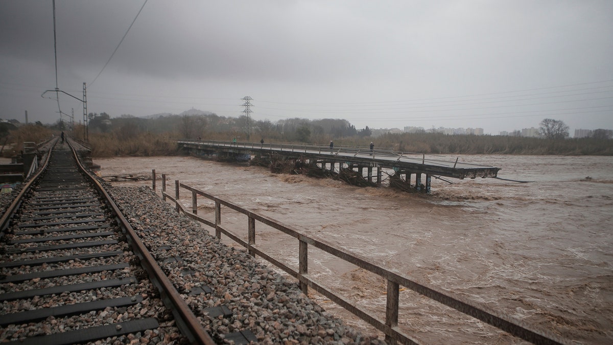 View of a collapsed train track and a bridge due a heavy storm in Malgrat, near Barcelona, Spain, Wednesday, Jan. 22, 2020.