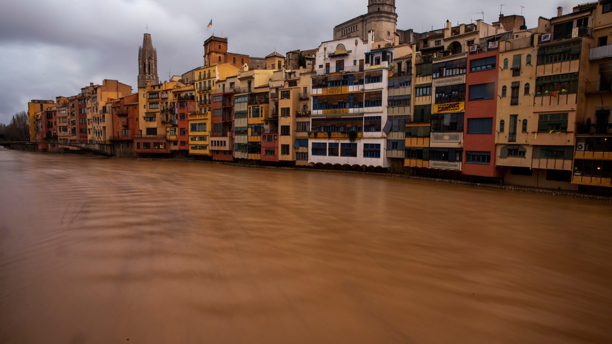 The river Onyar is seen swollen during a storm in Girona, Spain, on Thursday, Jan. 23, 2020.