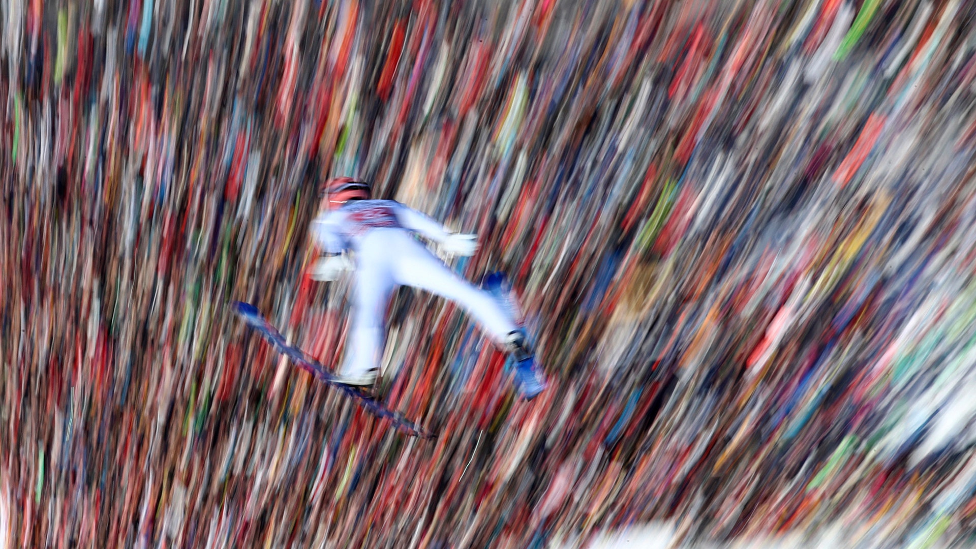 Jan Hoerl of Austria soars through the air during the trial round of the second stage of the 68th four hills ski jumping tournament in Garmisch-Partenkirchen, Germany, Jan. 1, 2020.