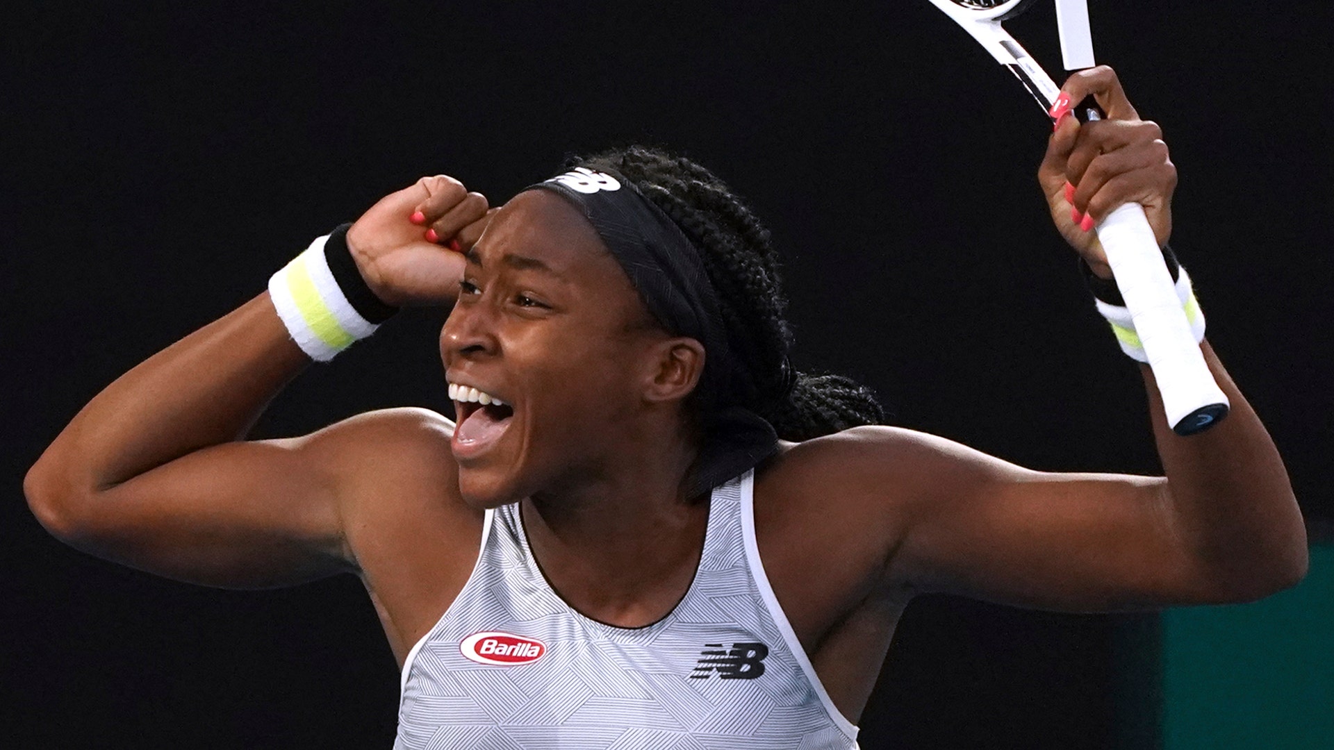 Coco Gauff of the U.S. celebrates after defeating Japan's Naomi Osaka in their third-round singles match at the Australian Open tennis championship in Melbourne, Australia, Jan. 24, 2020.
