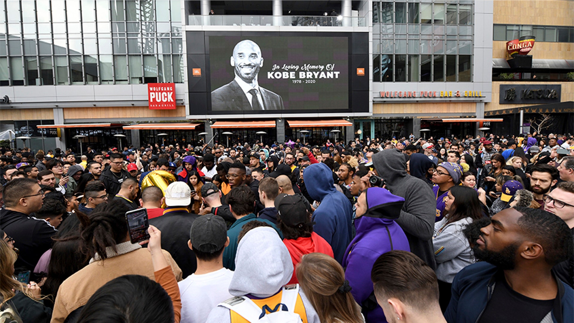 People gather outside Staples Center in Los Angeles, after the death of Laker legend Kobe Bryant.