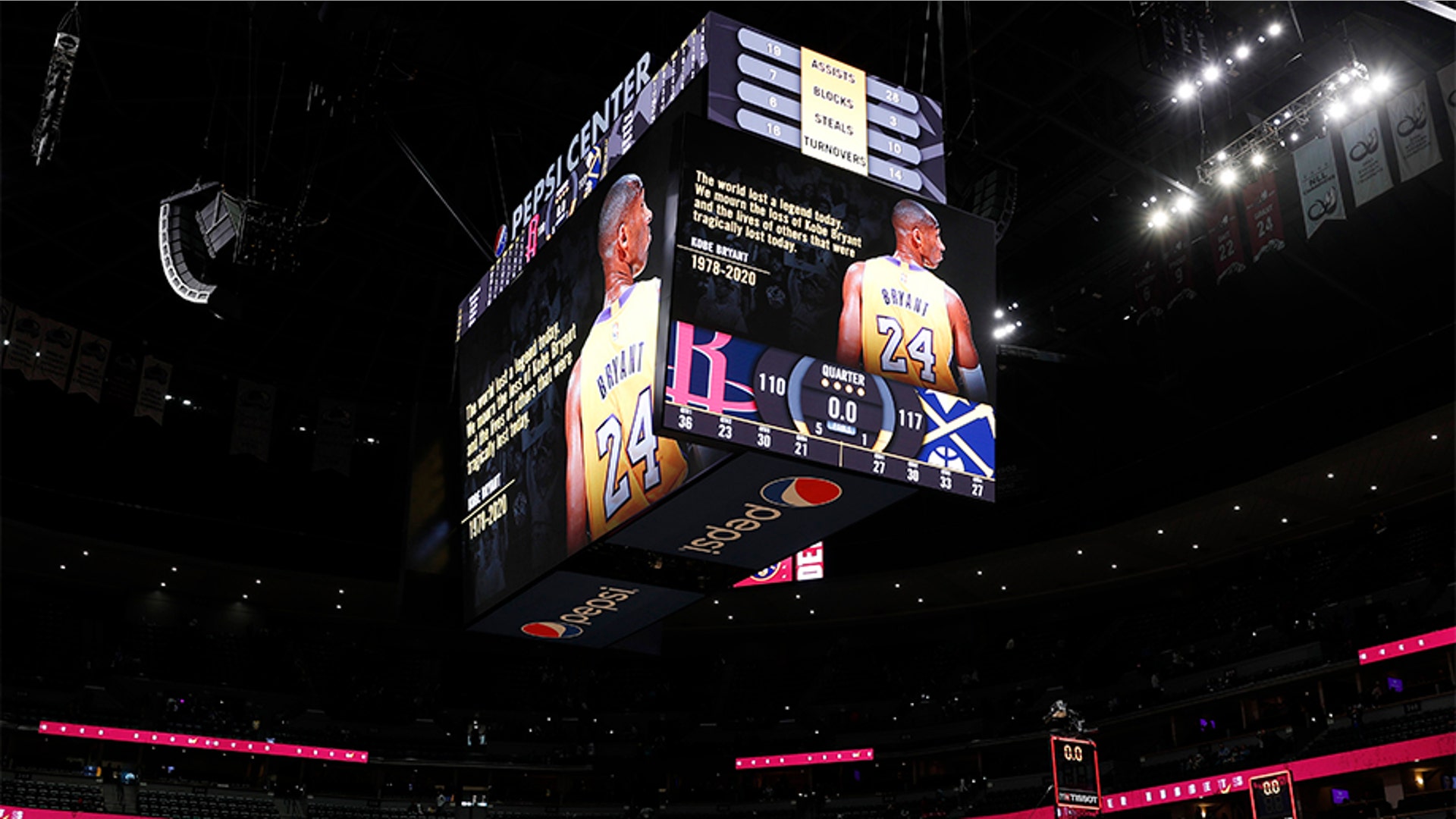 A tribute to Kobe Bryant illuminates the overhead scoreboard in Denver. 