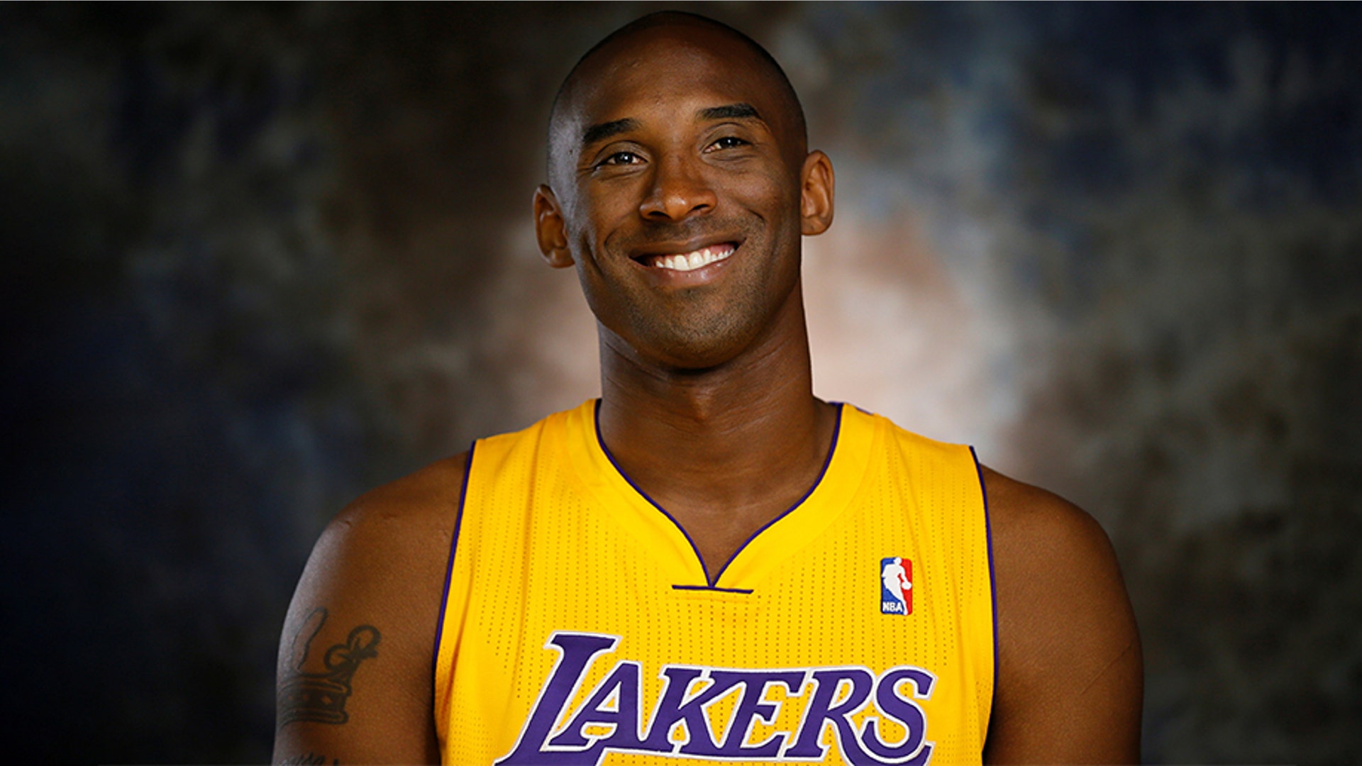 Lakers guard Kobe Bryant smiles during an interview at NBA media day for the Los Angeles Lakers basketball team in Los Angeles on October 1, 2012. 