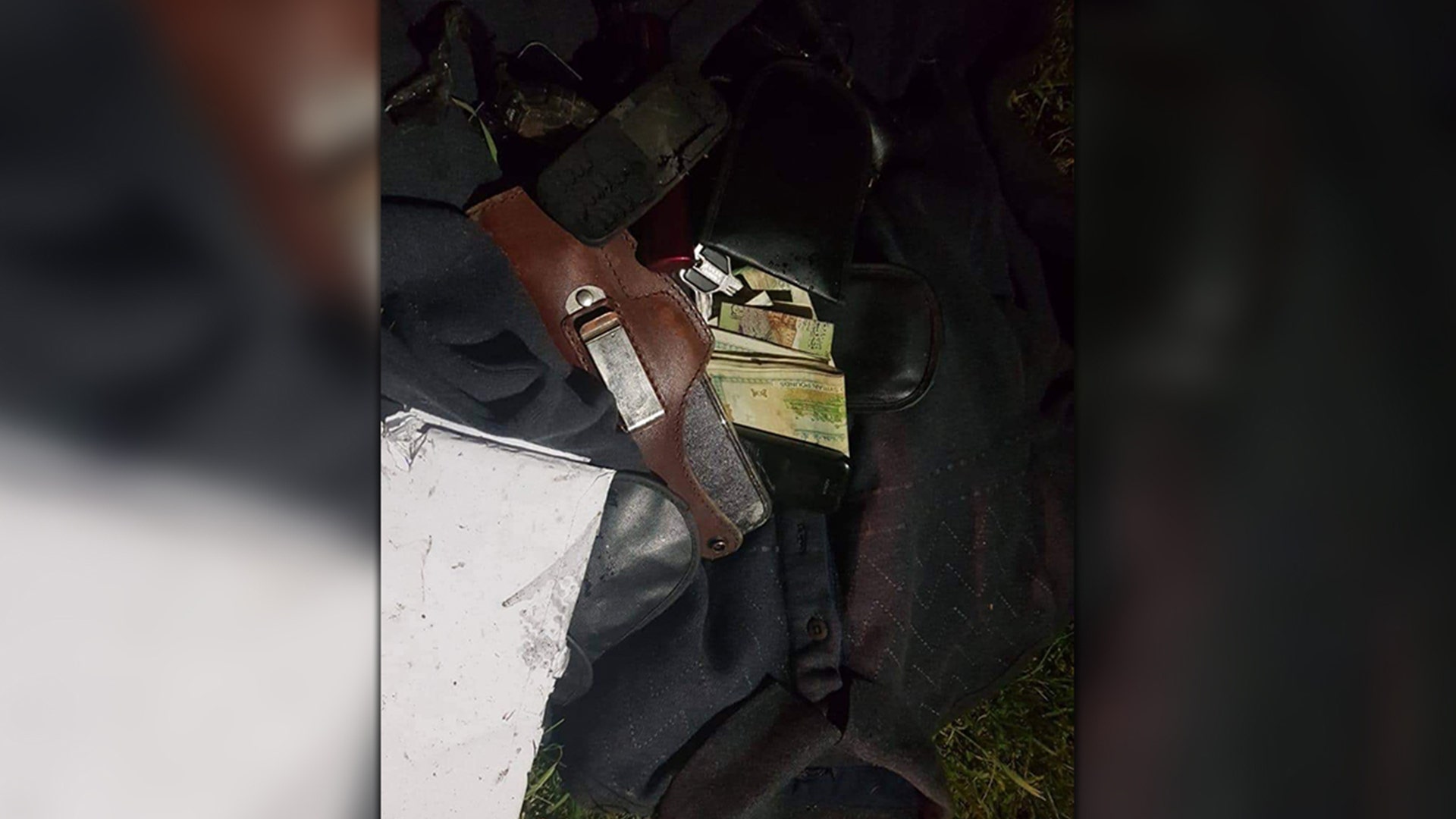 Some of the items Soleimani was carrying when he died. His phone is partially visible at the top left.