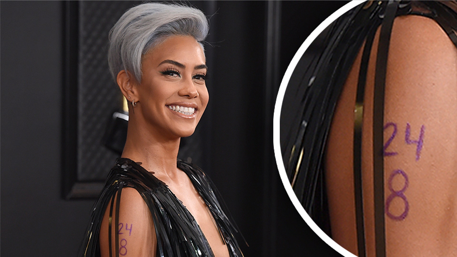 Sibley Scoles arrives with the numbers 24 and 8 on her arm in honor of the late Kobe Bryant at the 62nd annual Grammy Awards at the Staples Center in Los Angeles. 