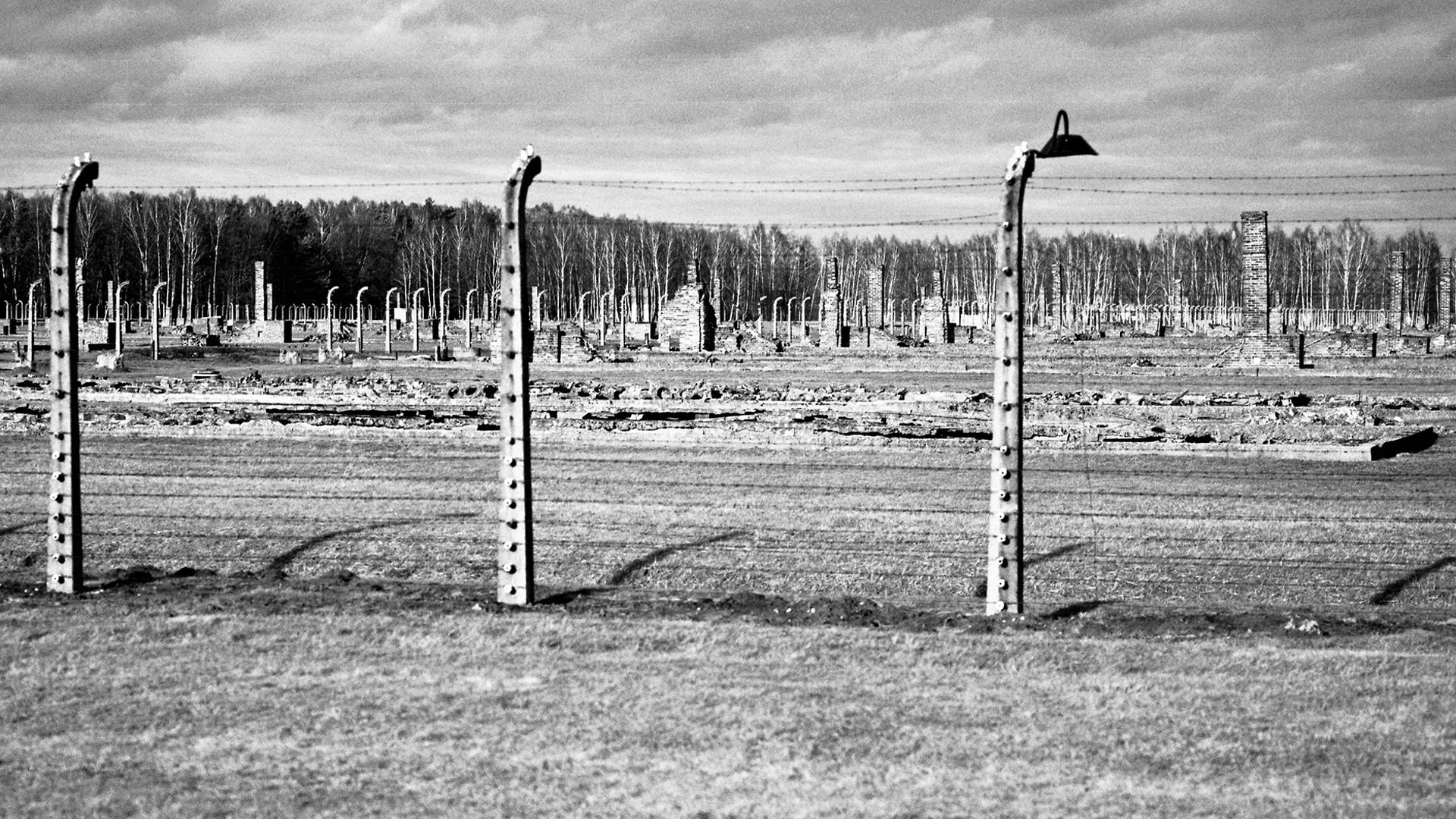 The remains of brick stone chimneys of prisoner barracks can be seen inside the former Nazi death camp of Auschwitz Birkenau or Auschwitz II. in Oswiecim, Poland. On Dec. 27, 2020, 75 years after its liberation, hundreds of survivors from across the world will come back to visit Auschwitz for official anniversary commemorations.
