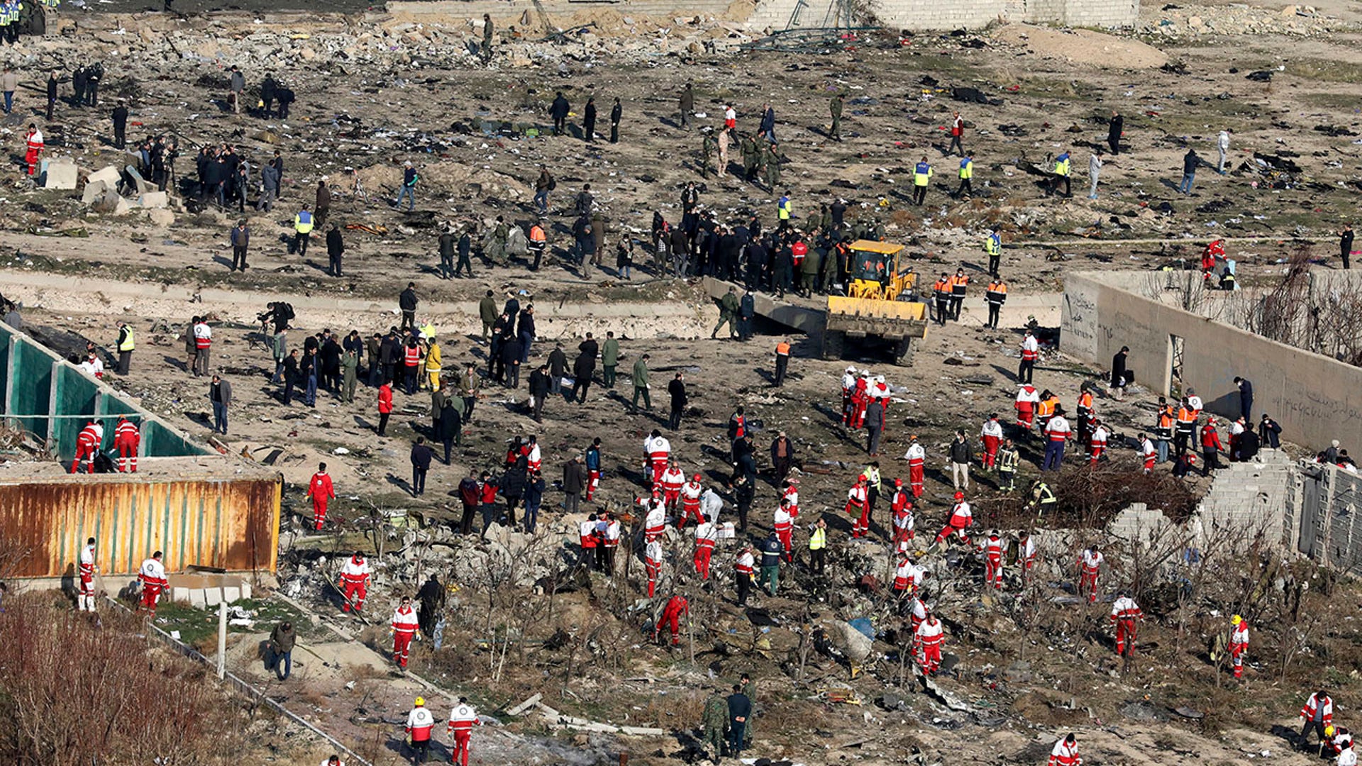 The plane crashed just minutes after taking off from the Iranian capital's main airport, turning farmland on the outskirts of Tehran into fields of flaming debris .