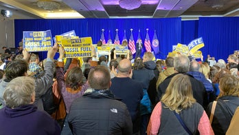 Buttigieg interrupted at New Hampshire campaign stop by climate change activists