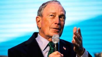 Bloomberg's ruff time: Dem greets dog by shaking its mouth