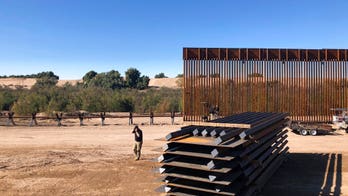 Border town 'man camps' spark coronavirus fears as Democrats call for halt on wall project