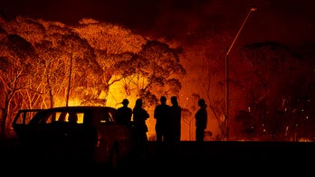 More than two dozen in Australian province charged with deliberately starting brush fires