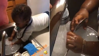 Grandmother has 9-month-old baby 'doing dishes' in funny viral video