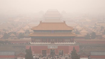 Woman enters China's Forbidden City in luxury SUV, sparking outrage