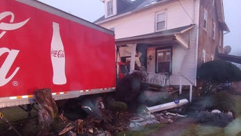 Coca-Cola truck crashes into Pennsylvania home