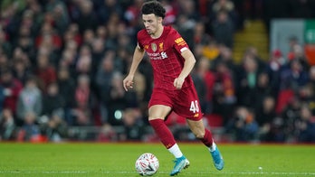 Teenager Jones, veteran Rooney take center stage in FA Cup