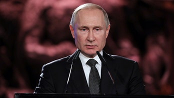 Who is Vladimir Putin, the Russian president and ex-KGB officer?