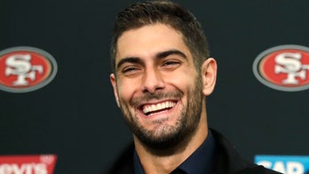 49ers' Jimmy Garoppolo takes hit in wallet for throwing ball into stands after Week 17 win