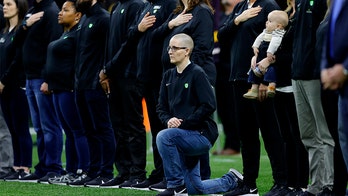 Minnesota 'Teacher of the Year' kneels during anthem at college football championship: 'A very respectful protest