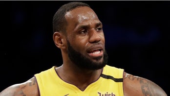 Kobe Bryant dead: LeBron James visibly emotional as he returns to Los Angeles with team