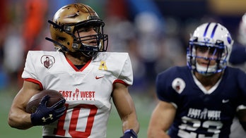 LeMay's 2 TDs lead East over West 31-27 in Shrine Bowl