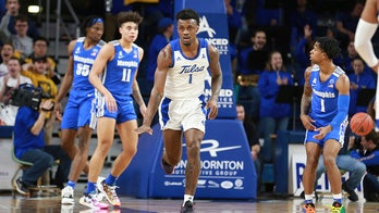 Horne helps lead Tulsa to big upset of No. 20 Memphis