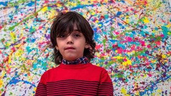 7-year-old painter wows art world in Germany