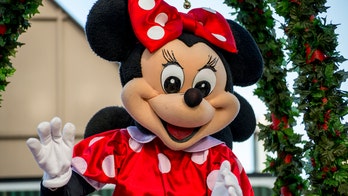 Woman in Minnie Mouse costume filmed brawling with Las Vegas security guard in front of tourists