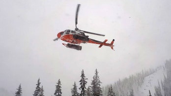 2 teen snowboarders lost in Canadian backcountry burned homework to survive, officials say