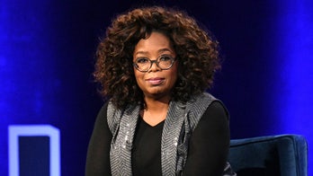 Oprah Winfrey falls onstage while talking about balance during motivational tour