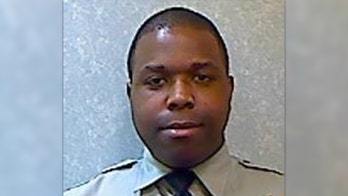 Maryland officer denied bail in handcuffed man's fatal shooting