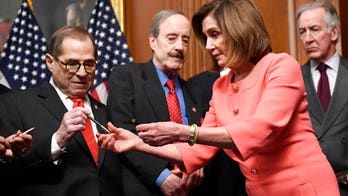 Pelosi hands out commemorative pens as House transmits Trump impeachment articles to Senate