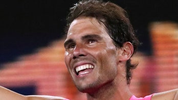 Australian Open ball girl hit with Rafael Nadal shot, tennis star makes up for it with a kiss